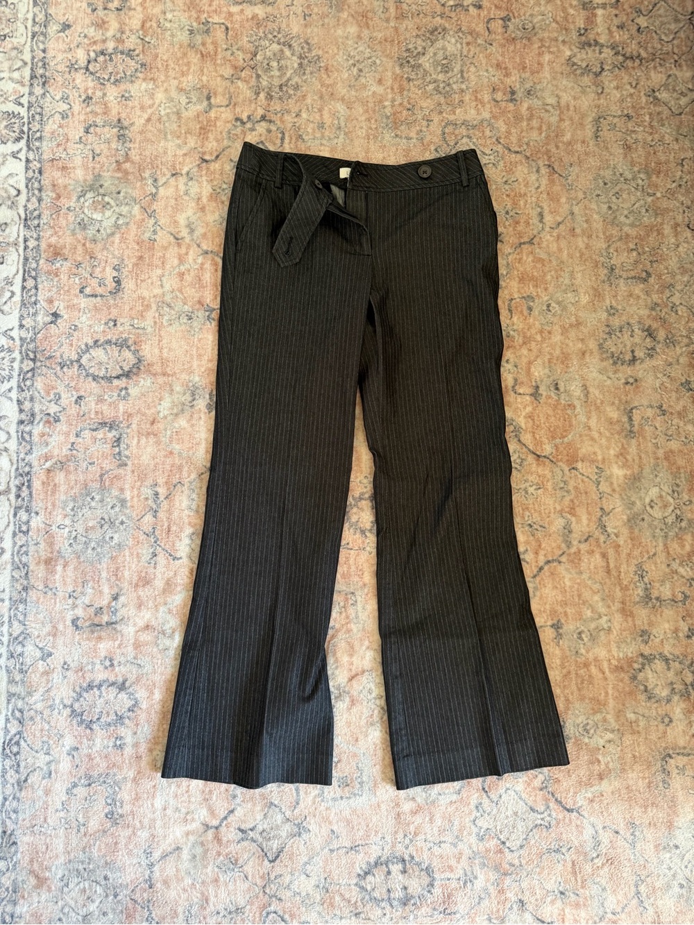Ann Taylor Loft black pinstriped business casual pants, size 6. Wide leg fit.